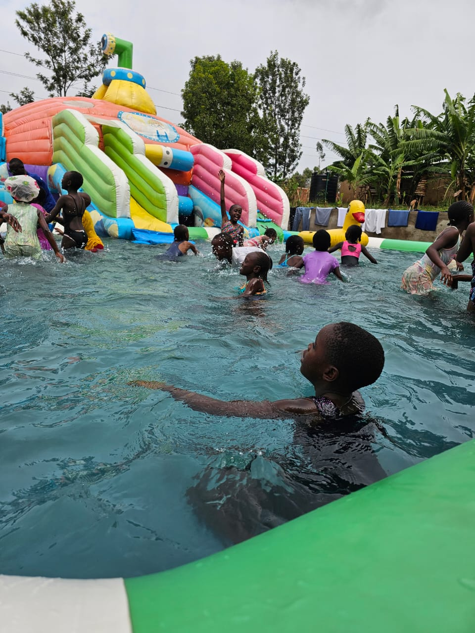 Children at the CabHouse pool